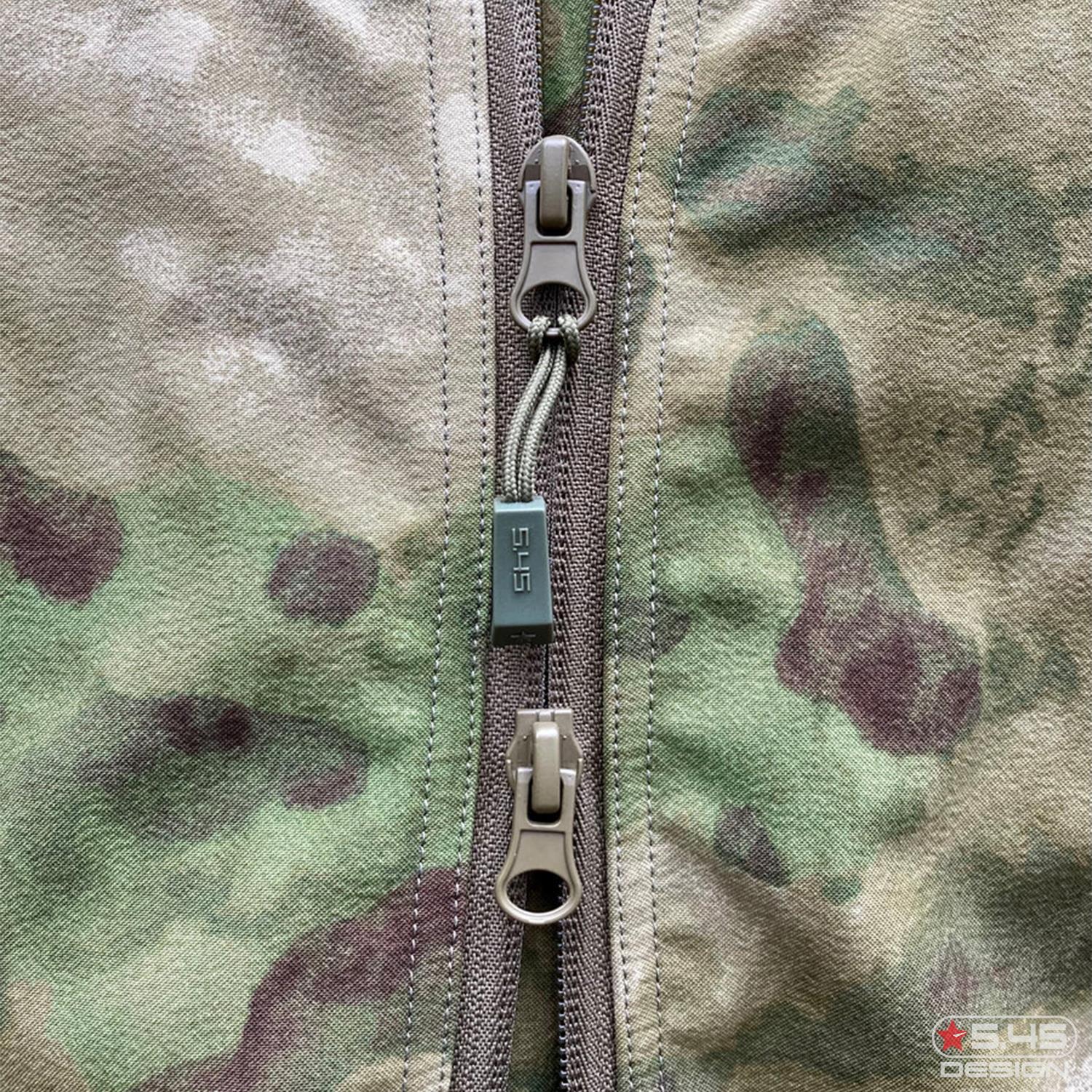 A two-lock zipper provides access to the waist gear.